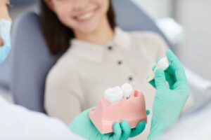 dentist explaining tooth extraction