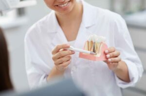 dentist explaining tooth extraction