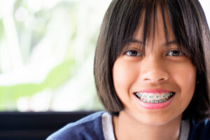 girl is standing smiling