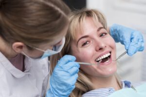 portrait-happy-young-woman-dentist_23-2148396223