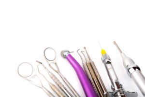 instruments-dentist-with-white-background_1232-306