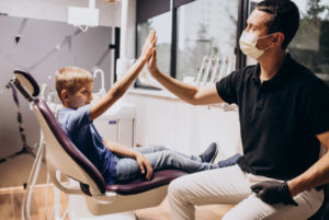 kid at a dentist